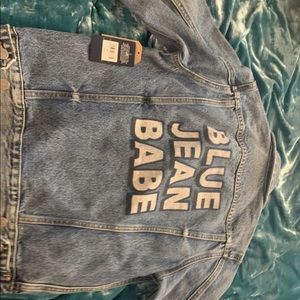 lucky brand jean jacket with decal on back